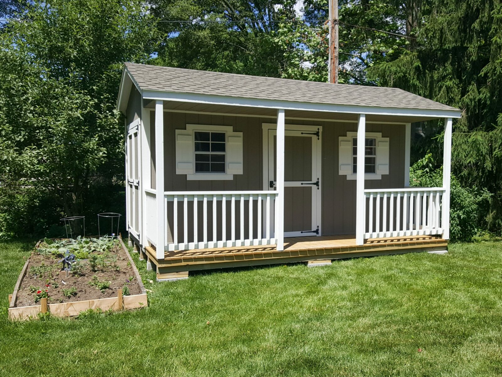 cabin shed with porch used as garden shed in central ohio